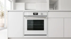 "A modern white wall oven with a digital display set to 350 degrees F, located in a bright and clean contemporary kitchen."