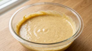 Blending Sour Cream, Vanilla, and Cinnamon for The Best Peach Cake